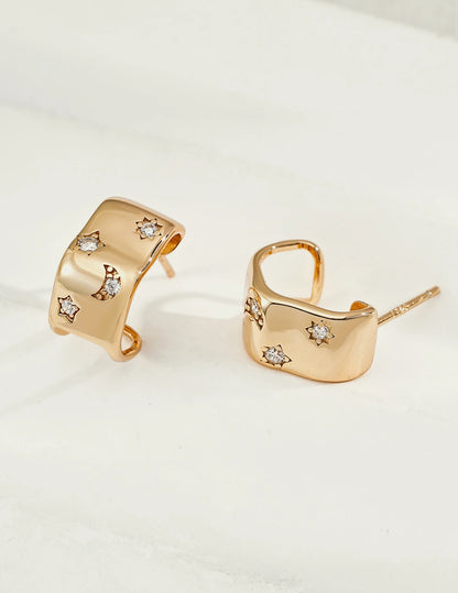 Celestial Star & Moon Huggie Earrings in gold, 18K gold-plated 925 sterling silver with cubic zirconia stars and moon