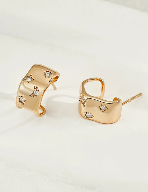 Celestial Star & Moon Huggie Earrings in gold, 18K gold-plated 925 sterling silver with cubic zirconia stars and moon