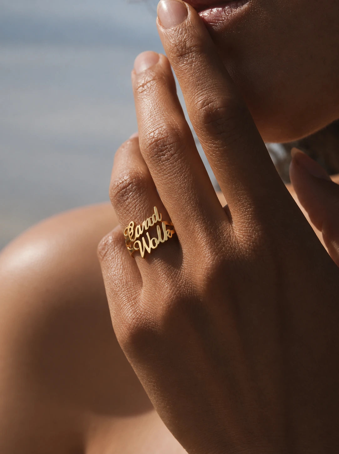 Model wearing a gold Canal Walk name ring