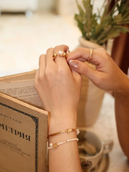 Faceted Pearl Claw Open Ring in gold, everyday lifestyle styling