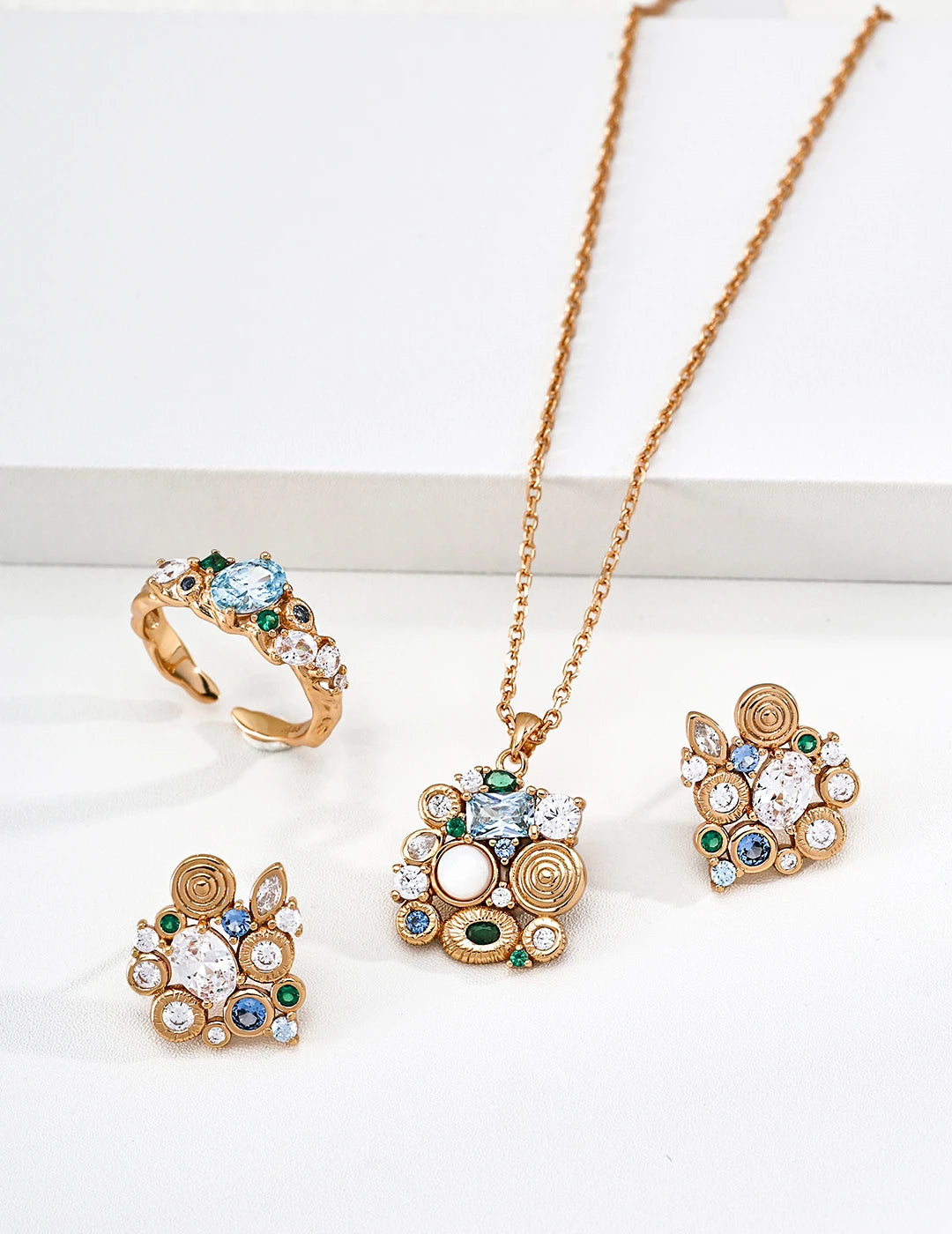 Forest Heartbeat Cluster Stud Earrings shown with the matching ring and necklace