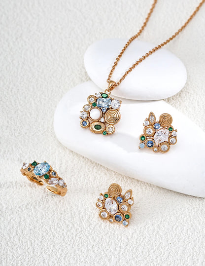 Forest Heartbeat Cluster Stud Earrings styled alongside the matching ring and necklace
