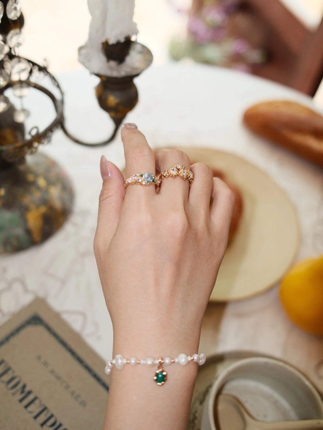 Model wearing the Forest Heartbeat Open Ring in a lifestyle setting