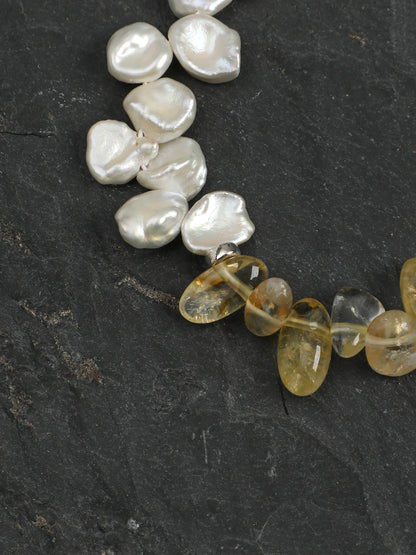 Close-up of the 925 silver spacer beads, bubble beads, and engravable round tag