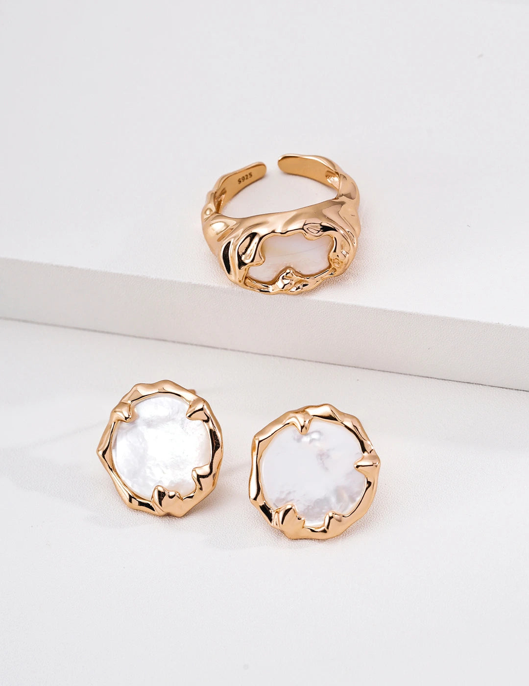 Molten Mother-of-Pearl Open Ring styled with matching mother-of-pearl drop earrings