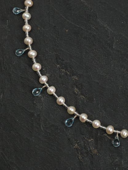 Close-up of the 925 silver hook clasp and engravable silver tag