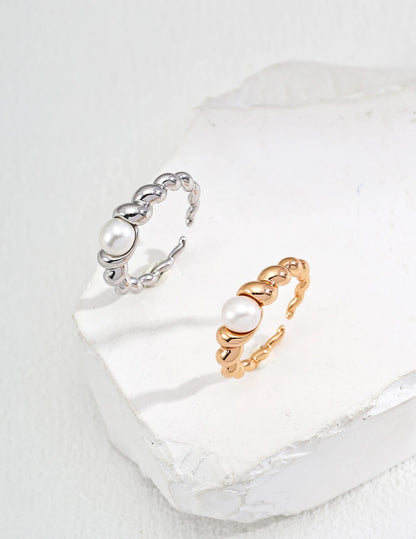 Drift Pearl Beaded Open Ring in gold and silver shown together