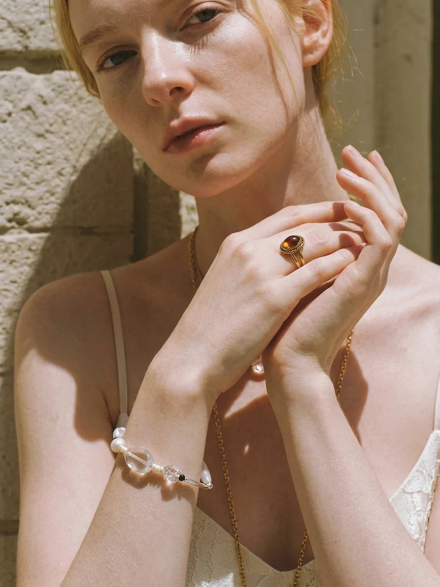 Model wearing the Psyours Pure Radiance bracelet on her wrist