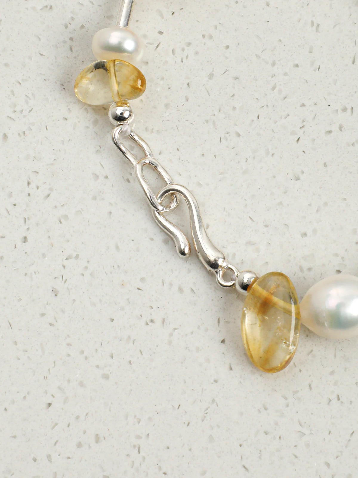 Close-up of the pearls and 925 silver straight tube spacers