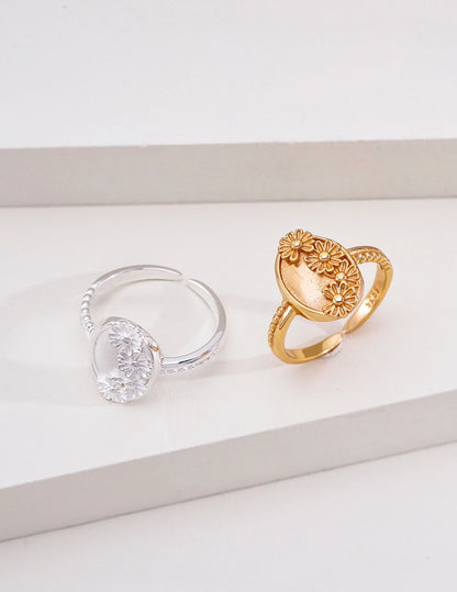 Vintage Daisy Oval Open Ring shown in both silver and gold colorways