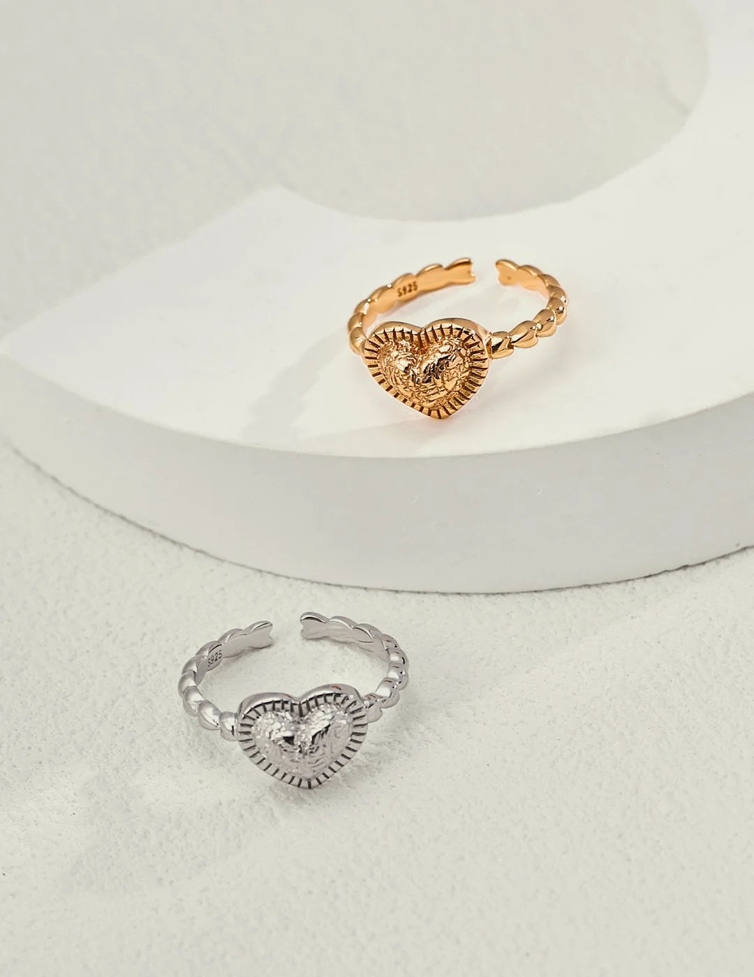 Vintage Textured Heart Open Ring in gold and silver shown together