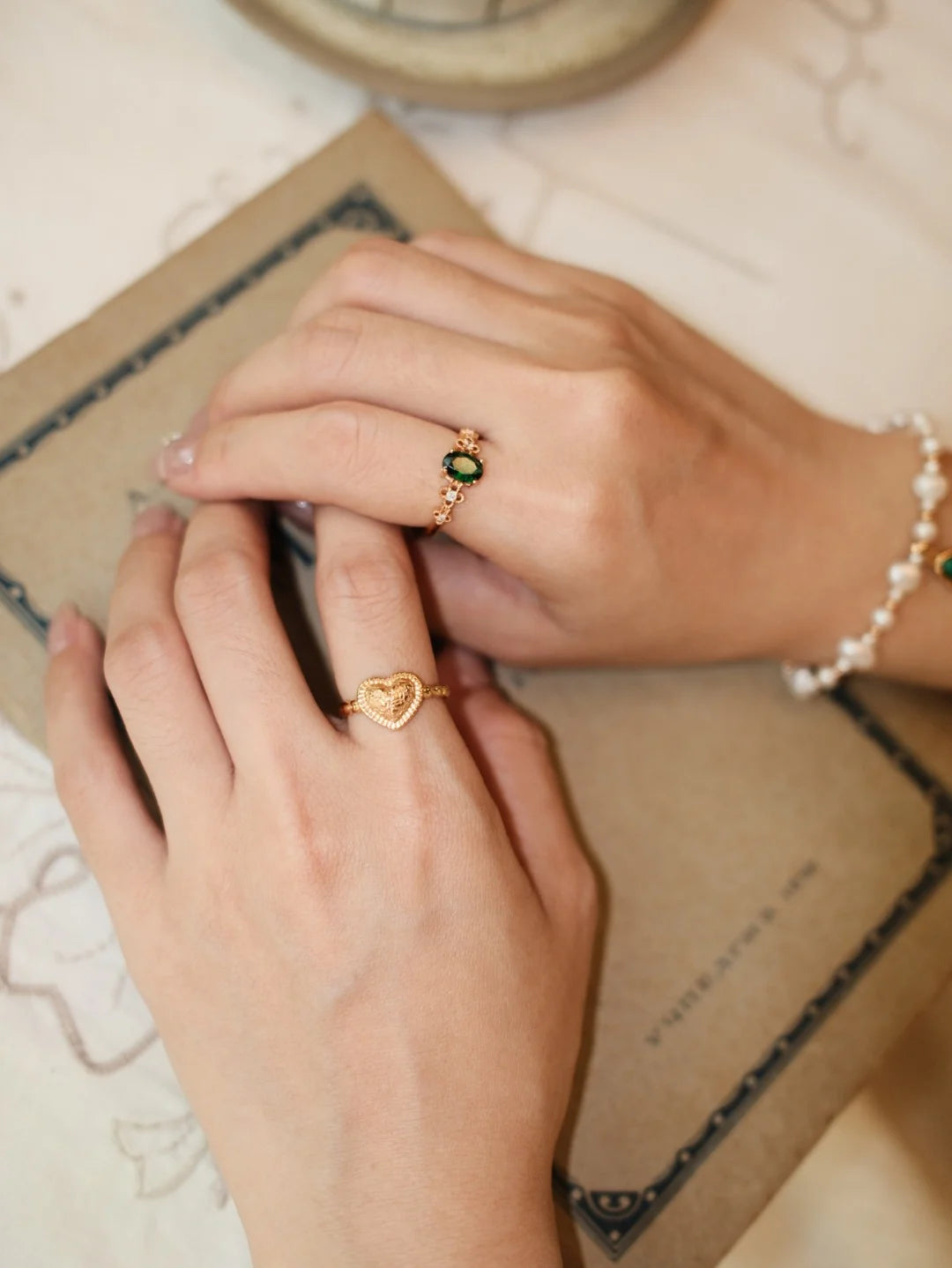 Vintage Textured Heart Open Ring in gold styled with a pearl bracelet