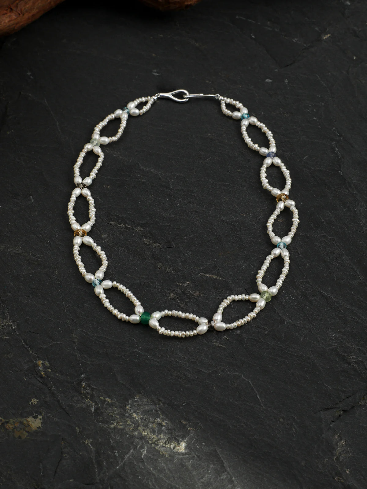 Full-length view of the Woven Waves pearl lace necklace